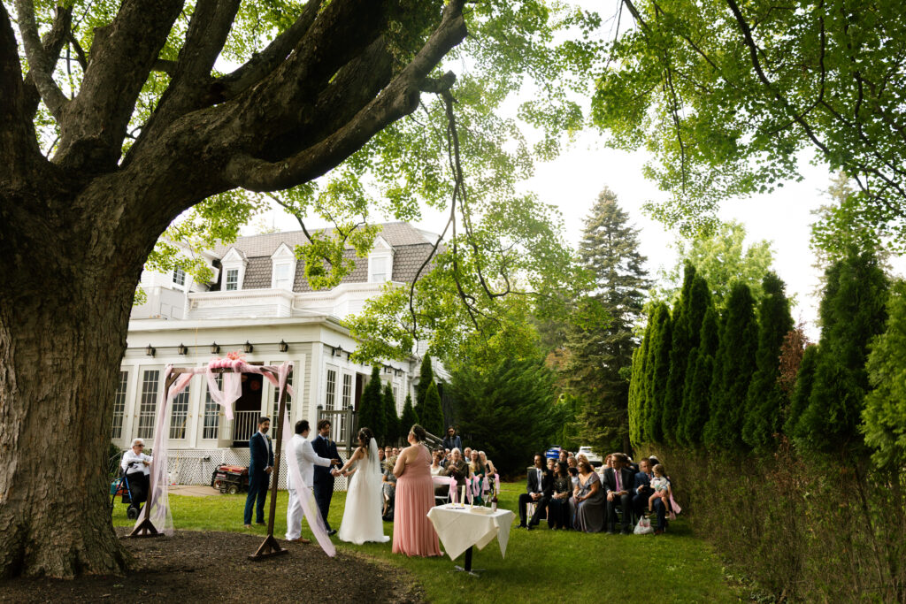 Rachel and Jake during their outdoor wedding ceremony at Bella Tori in Langhorne, PA