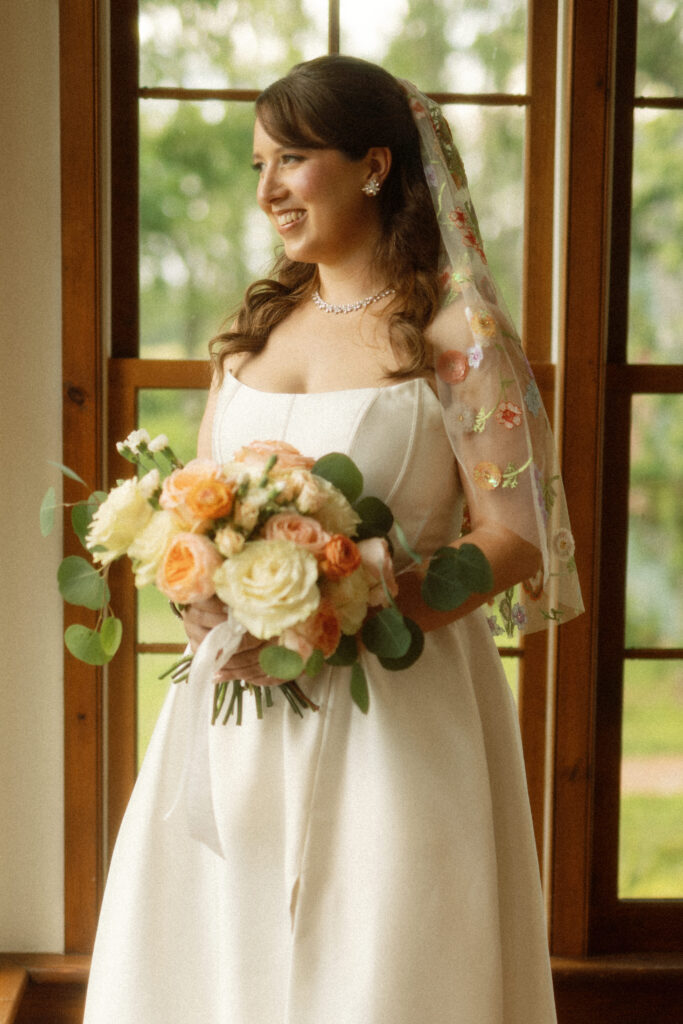Bridal portrait in soft light of Unionville Vineyards sunroom