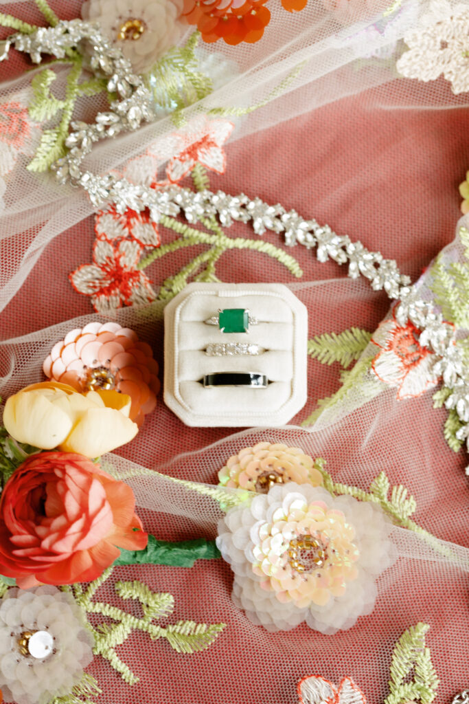 Flat lay of wedding veil and bridal jewelry captured by NJ wedding photographer
