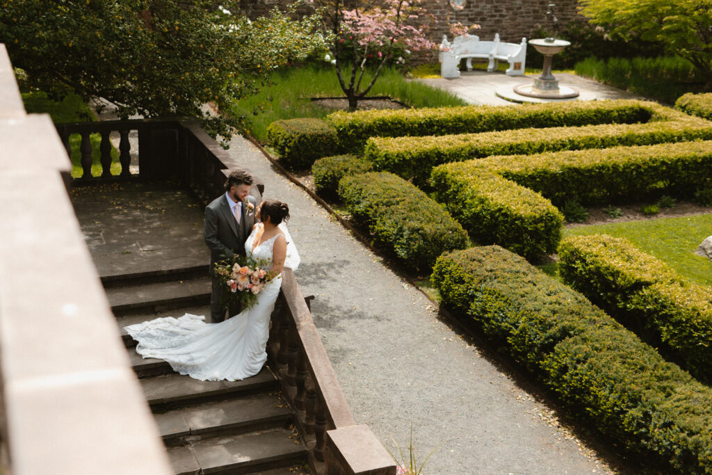 Philadelphia wedding photographer tyler gardens couple portraits floral arch garden